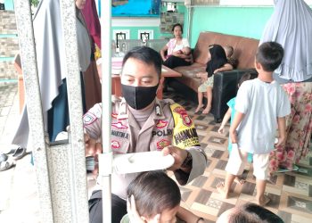 Bhabinkamtibmas Polsek Legok Polres Tangerang Selatan Mendukung Kegiatan Kesehatan Balita di Desa Caringin