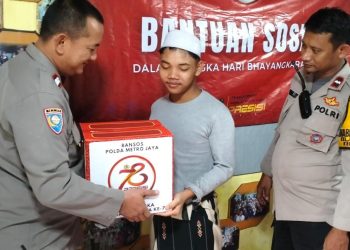 Menjelang Hari Bhayangkara Ke 78 Tahun 2024, Aiptu Roby Berikan Bantuan Sosial Berupa Sembako