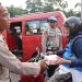 Polres Metro Depok Sambut Hari Bhayangkara dengan Berbagi Ratusan Paket Makanan kepada Warga Depok