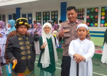 Bhabinkamtibmas Jakasampurna Amankan Pawai Milat ke-110 Sekolah Al Irsyad