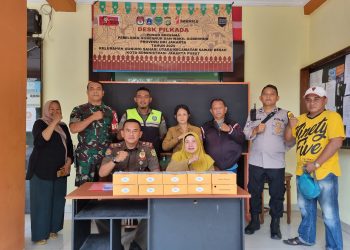 Bhabinkamtibmas Gunung Sahari Utara dan Tiga Pilar Siaga di Posko Pemilukada DKI