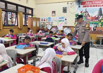 Bhabinkamtibmas Kawal Program Makan Bergizi di 11 Sekolah Penggilingan, Pastikan Gizi Anak Terpenuhi