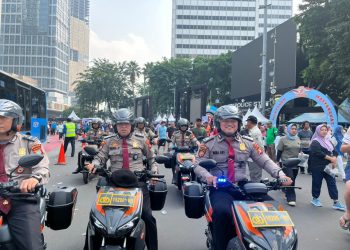 Personel Ditpamobvit Amankan CFD dan Baksos HUT Bhayangkara ke-79 di Bundaran HI