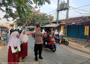 Pengaturan Lalu Lintas Pada Jam Masuk Sekolah Di Kedung Waringin