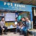 Jaga Bekasi On The Spot, Bhabinkamtibmas Sambangi Pos Kamling Desa Tridayasakti Perkuat Kamtibmas Warga