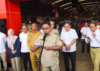 Bank DKI Gelar Akad Massal Pembiayaan Pedagang Pasar Induk Kramat Jati, Polsek Kramat Jati Pastikan Kegiatan Aman